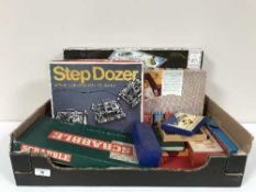 A box of assorted board games inc.