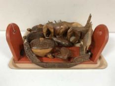 A tray of wooden animal ornaments, bookslide,