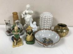 A Japanese Kutani porcelain bowl painted with a village landscape, signed,