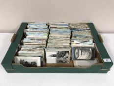 A large box of assorted 20th century postcards