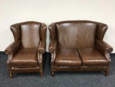 A Chesterfield style two seater wingback settee and matching armchair upholstered in brown leather