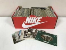A shoe box of mixed 20th century postcards