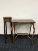 A shaped mahogany two-tier occasional table together with a mahogany plantstand