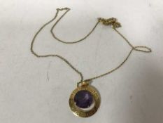 A 14ct gold and amethyst pendant on chain
