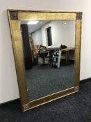 A large gilt framed mirror