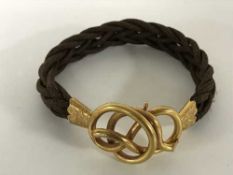 A large hair ornament with 15ct gold clasp