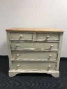 A painted pine five drawer chest