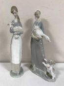 A Lladro figure of a lady holding a goose,