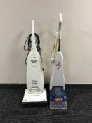 A Panasonic upright vac together with a Bissell quick wash carpet cleaner