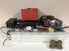 A H Samuel wall clock and a box of photographic equipment