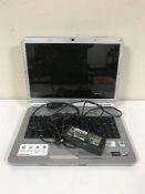 A Sony Vgn-NS 11J lap top with lead