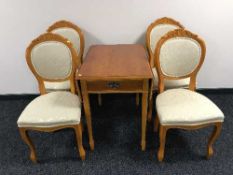 A yewwood drop leaf table fitted with a drawer together with four balloon style chairs