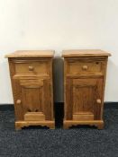 A pair of pine bedside cabinets fitted a drawer