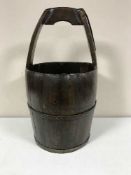 An antique Chinese metal bound bucket