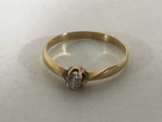 An 18ct gold diamond solitaire ring, 0.