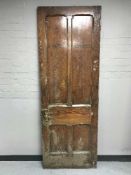 A vintage pine ladies toilet door