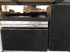 A Bang & Olufsen Beocentre 500 with speakers and a case and bag of LP records