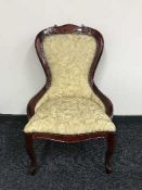 A reproduction mahogany Victorian style lady's chair