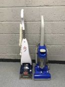 A Bissel quick wash carpet cleaner together with a upright vacuum