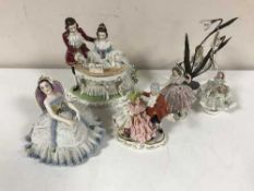 Five Dresden style china figurines and a Royal Doulton flower fairy