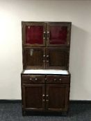 A mid twentieth century oak Neatette kitchen cabinet
