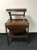 A mahogany drop leaf trolley and a luggage stand