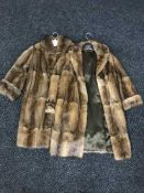 Four lady's 3/4 length fur coats