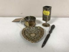 A silver napkin ring together with a heart shaped pin dish,