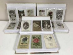 Three albums of early 20th century greetings postcards