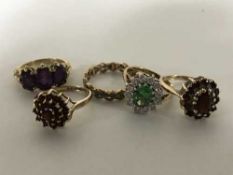 Five gold rings, variously set with turquoise, garnets, amethysts etc, 14.