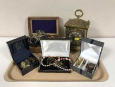 A decorative gilt metal French style mantel clock together with four boxes containing assorted