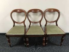 A set of six Victorian mahogany balloon backed chairs