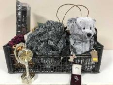 Two crates containing hand bags, teddy bear,