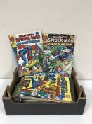 A box containing assorted Marvel and DC comics including Spiderman,