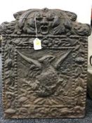 A Victorian cast iron fire back