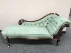 A Victorian mahogany chaise longue upholstered in two-tone green fabric