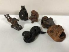 Six carved hardwood netsukes of animals - rat,