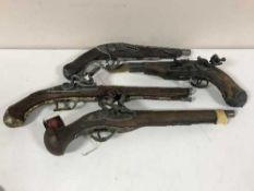 Four replica flintlock pistols