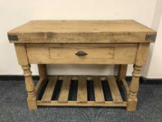 A reclaimed pine butcher's block fitted with a drawer,