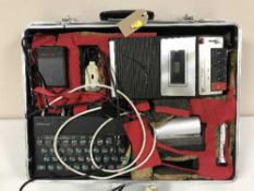 A 1980's Hitachi portable TV, together with a cased ZX Sinclair Spectrum with accessories,