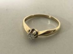 A 14ct gold diamond solitaire ring, 0.
