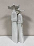 A Lladro figure of two nuns