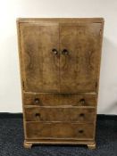 An early 20th century walnut linen chest