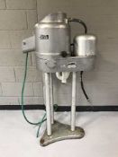 A commercial potato peeler