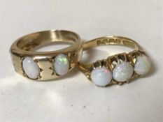 An antique 18ct gold opal set ring,