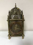 A 17th century style brass lantern clock