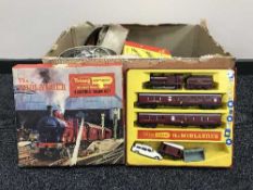 A box containing a collection of Triang Railways accessories,
