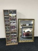 A contemporary set of open shelves, CDs,