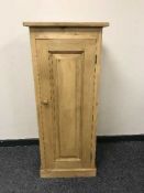 A reclaimed pine single door cabinet