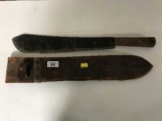 A machete in leather sheath